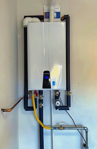 https://fremantlehotwater.com.au/uploads/2025/06/instant-hot-water-systems-63860.jpg
