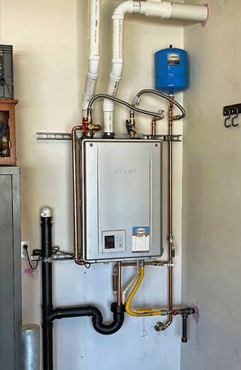 https://fremantlehotwater.com.au/uploads/2025/06/instant-hot-water-systems-98444.jpg